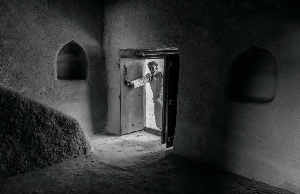 Shadowed doorway in an old interior
