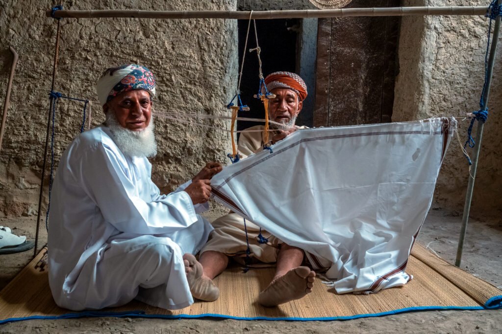 Street portrait of men seated together