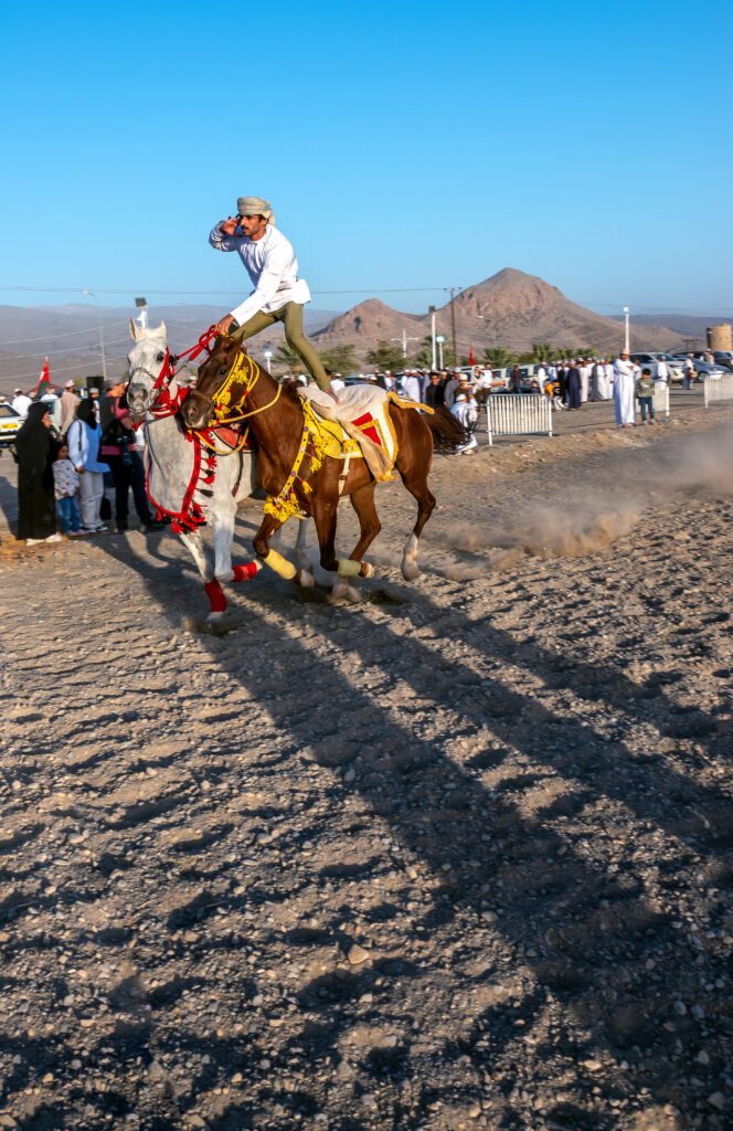 Horse riders in motion during a festival