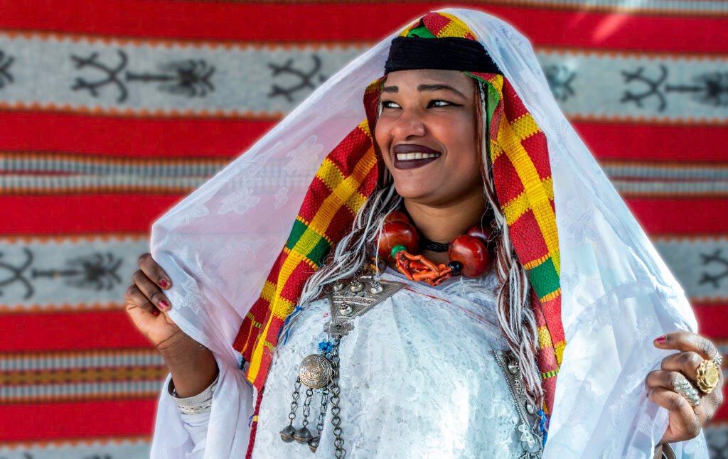 Portrait of a smiling woman in traditional dress